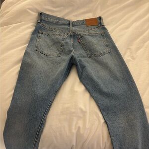 Levi’s 501 ripped jeans